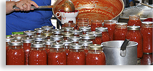 Canning tomatoes at the Union County Cannery